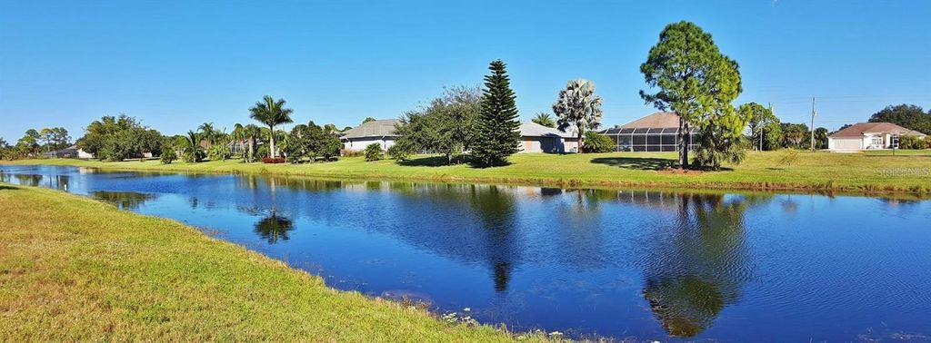 Photo of 847 Rotonda Circle, Rotonda West, FL 33947 (MLS # A4690432)