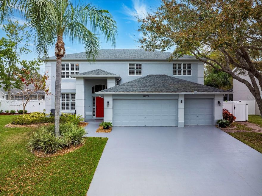 Located in a quiet neighborhood in the popular East Lake Woodlands community, this exquisite property features 3,085 square feet of living space.  The heart of the home lies in its spacious kitchen, where granite countertops, new cabinets, newer stainless steel appliances and a large island create a perfect blend of functionality and style. In addition to the kitchen pantry, the owner added a second walk in butler's pantry for storage.  Ideal for gourmet cooking and entertaining. The kitchen overlooks the family room with built in shelving and gorgeous outdoor living space.  The heated pool was completely renovated to add a spill over spa, salt chlorination and sun shelf. The surrounding travertine deck provides plenty of space for lounge chairs and tables as well as an area with a built in grill and beverage refrigerator.  The main floor also includes a living room/dining room combo with wood floors, a laundry room with a storage closet and a half bathroom.  Upstairs you will find the primary bedroom and bathroom featuring 2 custom walk-in closets, 2 sinks, walk-in shower, separate tub and separate water closet.  Three additional bedrooms and full bathroom upstairs as well as a bonus loft space, all with wood floors.  The floorplan is perfect for large families needing a play room, exercise space, dedicated office space or even possibly a 5th bedroom.   The impressive 3 car garage and driveway were renovated in 2024 including industrial grade epoxy.  Additional highlights include plantation shutters throughout, roof 2020, A/C units 2023 and 2024, and hot water heater 2022.  Zoned for Forest Lakes Elementary, Carwise Middle School and East Lake High School.  The gated East Lake Woodlands community offers optional memberships at the Ardea Country Club, golf courses, tennis courts, pickleball courts, fitness center and more.
