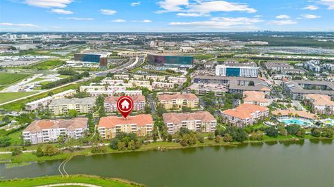 Photo of 5036 Shoreway Loop #30405, Orlando, FL 32819 (MLS # S5138282)