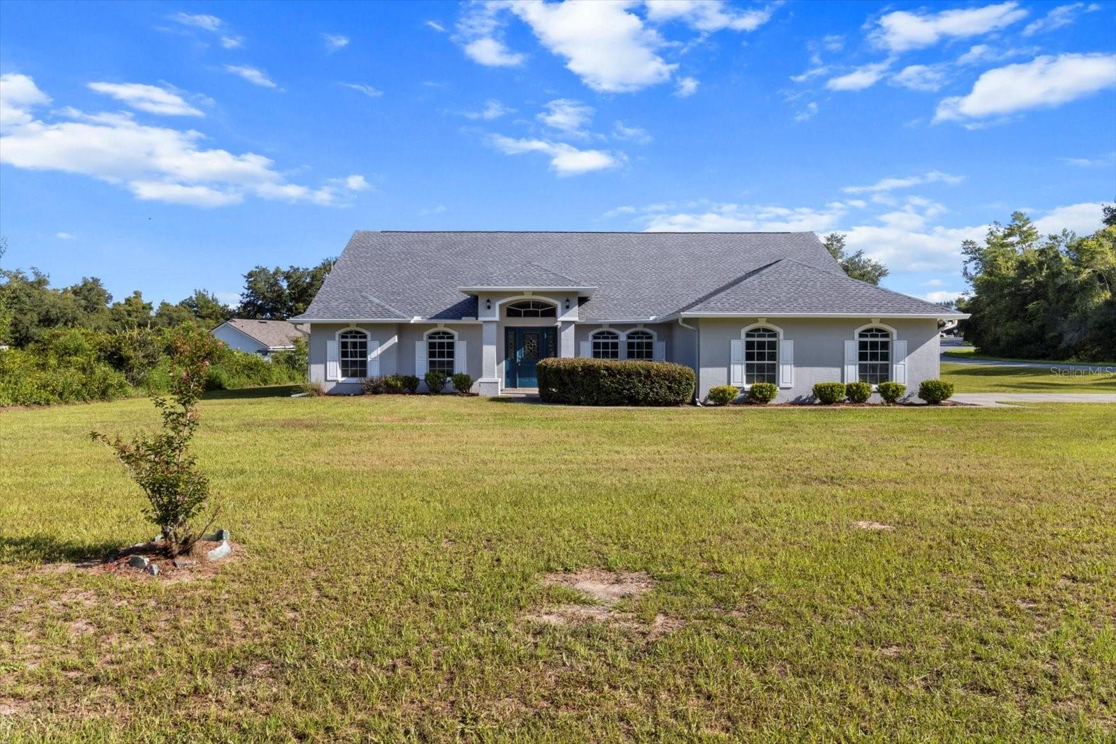 Experience spacious, turnkey living in this beautifully renovated 4 bedroom, 2 bathroom, home offering over 3,000 square foot of thoughtfully designed living space in the heart of Ocala. Featuring a desirable split bedroom floorplan, this residence has been updated with a brand new roof, HVAC system, water heater, garage door, and stylish ceiling fans throughout. Step into a modern interior with fresh paint, new flooring, and a fully remodeled kitchen showcasing sleek finishes and stainless steel appliances. Both bathrooms have been upgraded for a spa like feel. A generous 2 car garage adds convenience, while the neighborhood provides easy access to top schools, shopping, dining, and Ocalas outdoor lifestyle. This is refined Florida living move in ready and meticulously finished for comfort, efficiency, and style. Call for your showing today!