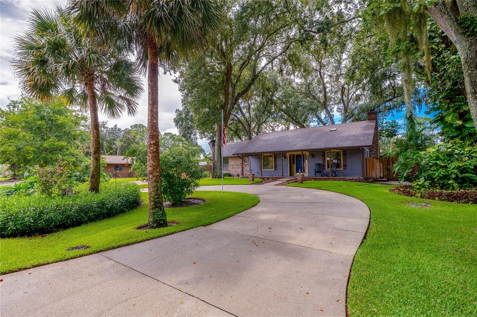 Beautifully updated 3BR/2BA home in the sought-after Florida Shores community of Edgewater, set on a spacious .29-acre lot just minutes from the Intracoastal, Indian River, and the sandy beaches of New Smyrna. This convenient location offers easy access to boating, fishing, dining, schools, airports, and I-95, making it the ideal blend of lifestyle and practicality. The Town of Edgewater is also in the final stages of installing underground utilities, a major neighborhood improvement that will enhance curb appeal and property values.
A wide circular driveway framed by mature landscaping makes a welcoming first impression, while oversized parking areas provide plenty of room for RVs, boats, and multiple vehicles. Two large sheds offer excellent storage or workshop space, giving you flexibility for hobbies and toys.
Inside, natural light fills the home through vaulted ceilings and skylights, creating a fresh coastal flair throughout. The open floor plan is anchored by a cozy wood-burning fireplace and features LVP flooring, updated appliances, and tasteful finishes that make the home move-in ready. A recent inspection is also available to qualified buyers, providing added peace of mind.
Step into the backyard and experience Florida living at its finest. The outdoor kitchen is a true centerpiece, featuring a built-in gas grill, wood-burning pizza oven, and bar fridge, while fruit trees, garden beds, and winding pathways create a lush, private retreat ideal for entertaining or relaxing at day’s end.
Whether you’re drawn to the oversized lot, the modern updates, or the vibrant coastal lifestyle nearby, 2824 Umbrella Tree Drive is the perfect place to call home.