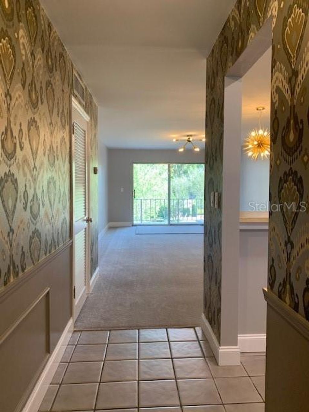 Photo of 1250 S Denning Drive #208, Winter Park, FL 32789 (MLS # O6368688)