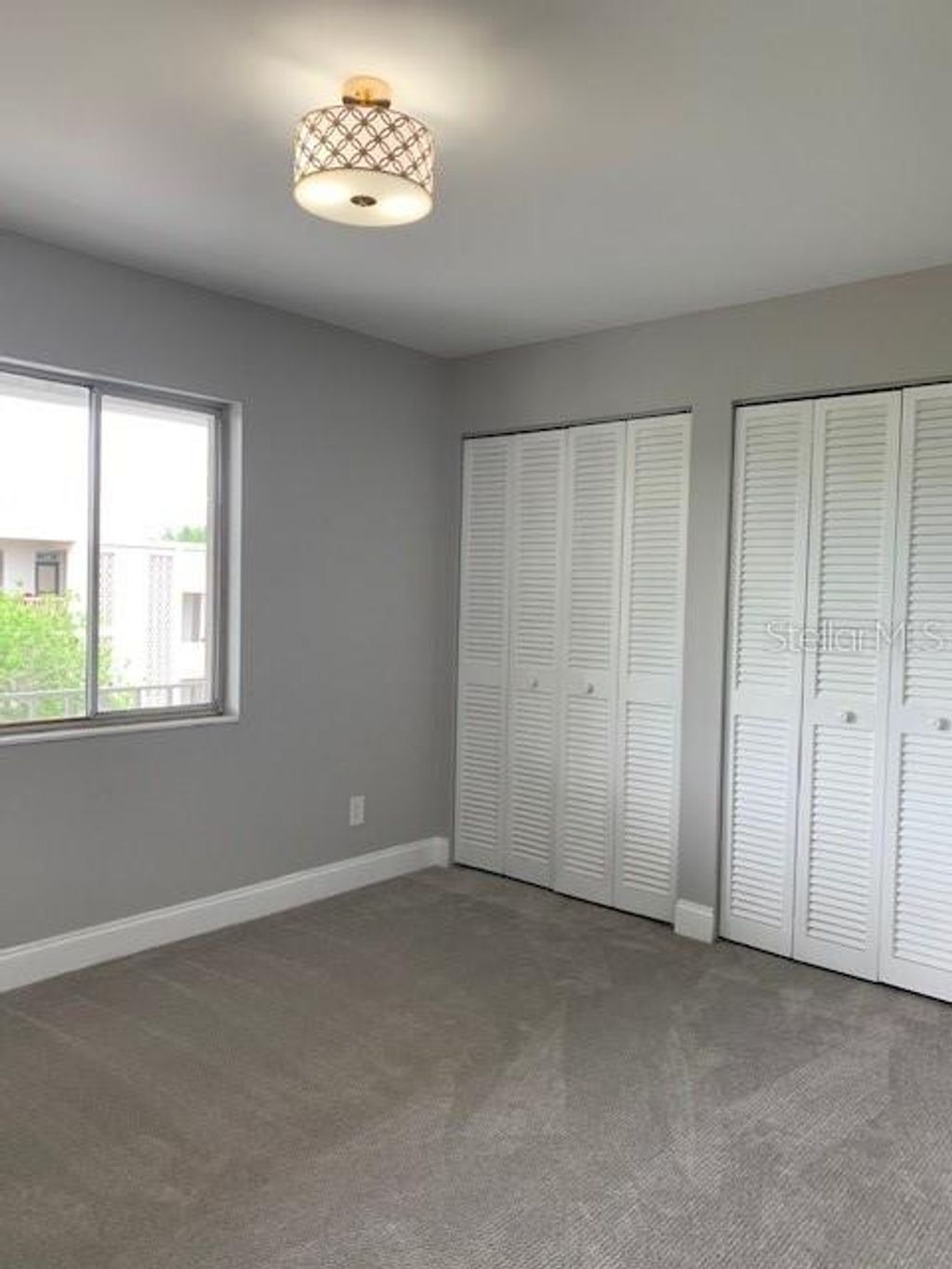 Photo of 1250 S Denning Drive #208, Winter Park, FL 32789 (MLS # O6368688)