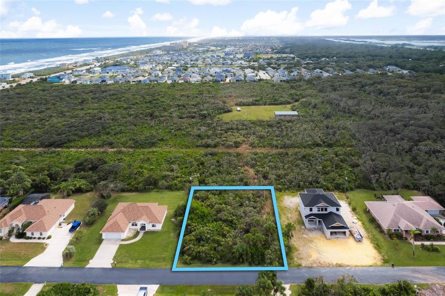 Located just a block from the beach sits this gorgeous untouched building lot.  Measuring 100X129 and just under a 1/3 of an acre, this lot is ready for you to build your dream home.  There is no time frame to build and you can choose your own builder. Enjoy a short walk to the beach and access to the private fishing pier on the ICW!  Conveniently located near Matanzas Inlet, Hammock Beach Club, Washington Oaks State Park, grocery store, shopping and restaurants!  Enjoy the Florida lifestyle!