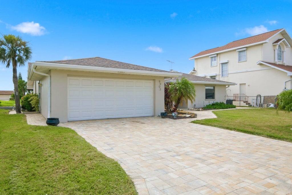 Photo of 9903 San Sebastian Way, Port Richey, FL 34668 (MLS # TB8531485)
