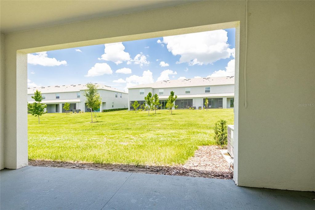 Photo of 33063 Tulip Petal Lane, Wesley Chapel, FL 33545 (MLS # TB8397561)