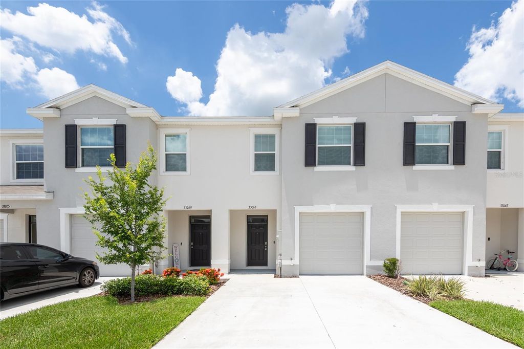 Photo of 33063 Tulip Petal Lane, Wesley Chapel, FL 33545 (MLS # TB8397561)