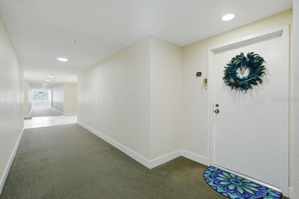 5940 PELICAN BAY PLAZA S 203