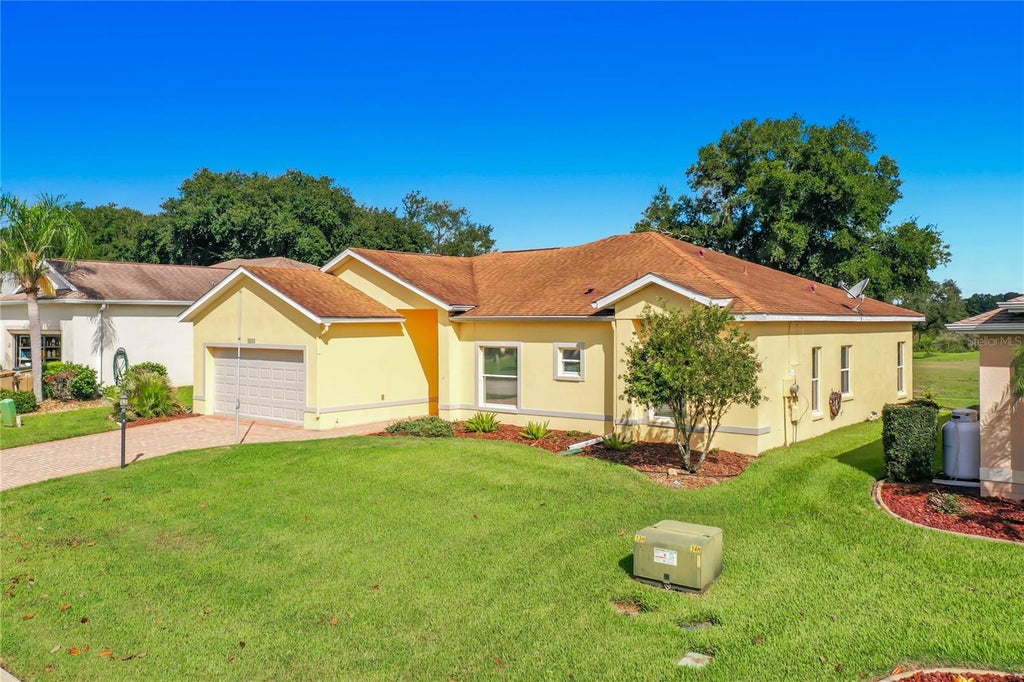 Photo of 5024 Long Meadow Drive, Leesburg, FL 34748 (MLS # G5117342)