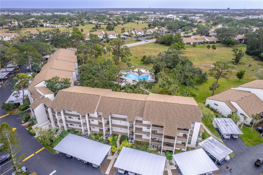 Welcome to Paradise at 832 Bird Bay Way and discover maintenance-free living in this updated **GROUND FLOOR CONDO** nestled in Bird Bay Village! This 2-bedroom 2 bath unit comes turnkey furnished and features luxury vinyl flooring throughout in an open-concept living space. The living room flows effortlessly to the serene views from your titled enclosed lanai, which opens up to a charming deck just steps away from Phase II pool, making it ideal for both everyday living and entertaining. The kitchen boasts granite countertops with stainless steel appliances and wood cabinetry. Both bathrooms have been updated with granite countertops; the guest bath features a tub with shower and primary bedroom with an en-suite bathroom has an updated tiled shower. AC unit installed in 2025.  This home's unbeatable location pairs perfectly with the amenity-rich community offering multiple pools, tennis and pickleball courts, a fitness center, library and clubhouse. Engage in a vibrant social activity, and events year-round. Bird Bay is adjacent to the Legacy Trail for biking and walking, just minutes from Historic Downtown Venice, and all the richness Venice offers. Whether you're seeking a seasonal retreat, forever home, or income-generating rental, this property delivers it all! Schedule your showing today and experience Venice coastal living at its finest!