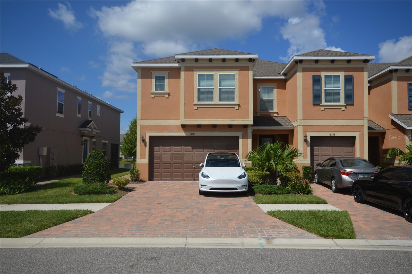 This beautiful townhome backs to a large pond with tree lined bank. The Liberty floor plan offers three bedrooms, two and a half baths and a two-car garage w/ EV charger. XL open kitchen with large island. dining room, spacious living room, and guest half bath. 2nd floor opens to a large loft and enjoys a split bedroom plan. Superb owner's retreat with relaxing bath, and huge walk-in closet. 2 very nice additional bedrooms and full bath on the opposite side of the 2nd floor. Convenient upstairs laundry room with washer & dryer. Sylvan Crossing: Perfect location, gated, and spectacular community pool.