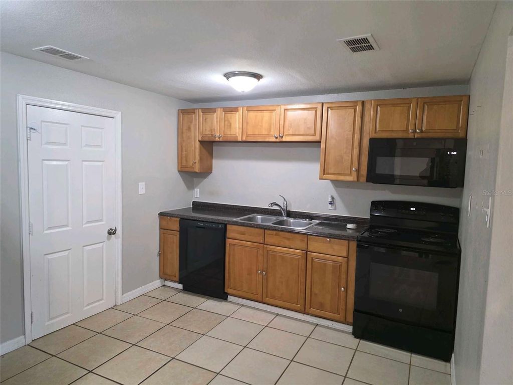 Photo of 2603 E 110th Ave, Tampa, FL 33612 (MLS # O6344522)