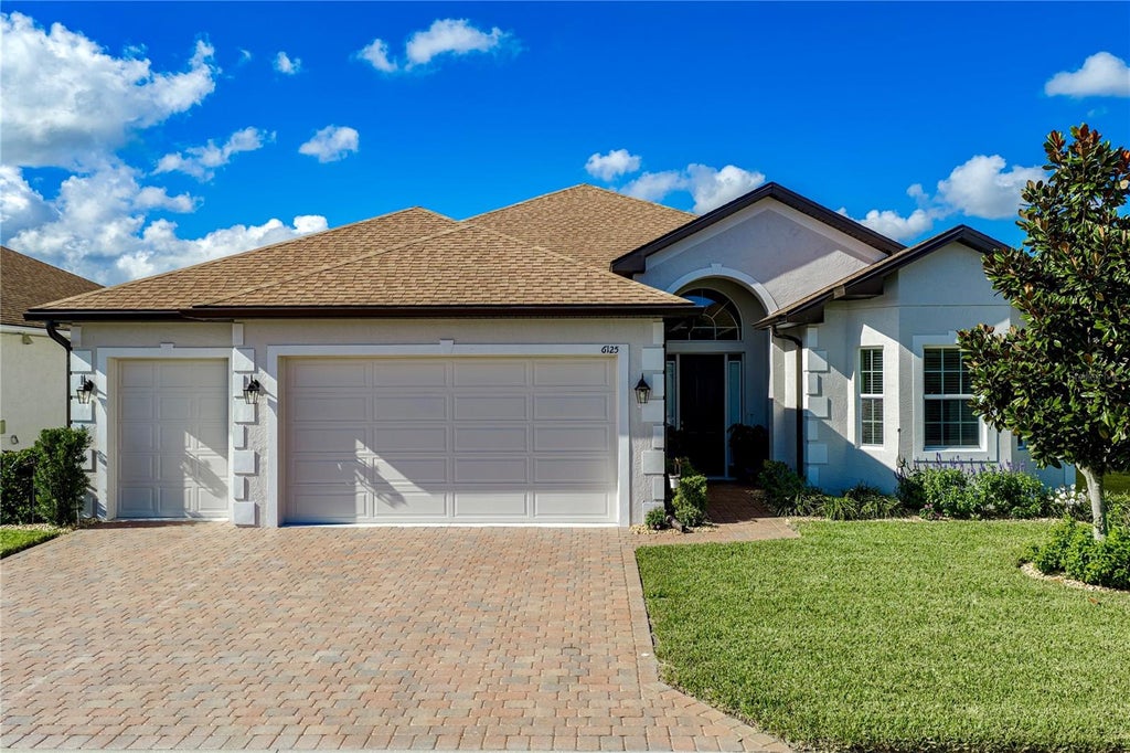 Photo of 6125 Pebble Beach Boulevard, Winter Haven, FL 33884 (MLS # P4940136)