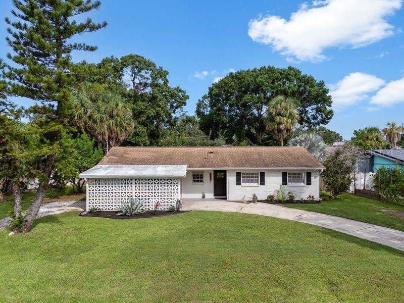 Welcome to 8405 Stillbrook Avenue in Tampa! This beautifully updated 3 bedroom/2 bathroom home combines modern interior upgrades (2025) with outdoor living perfect for the Florida lifestyle. The open floor plan features a fully renovated kitchen with new cabinets, quartz countertops, backsplash, breakfast bar, and stainless steel appliances. Both bathrooms have been completely updated, and the home has fresh paint, trim, solid core doors, and new hardware. A spacious fenced backyard is highlighted with low maintenance artificial turf, fire pit area, putting green, and large storage shed. The circular driveway offers ample parking for a boat and other RVs. As a part of this community, you'll also enjoy direct access to Tampa Bay with the community boat ramp. Prime location: you are just a few minutes from the Tampa International Airport, International Plaza, Westshore Mall, and a variety of other shopping and dining destinations. There is easy access to the Veterans Expressway and I-275, just minutes from Downtown Tampa, Midtown, and South Tampa. Contact me today to schedule a private showing!