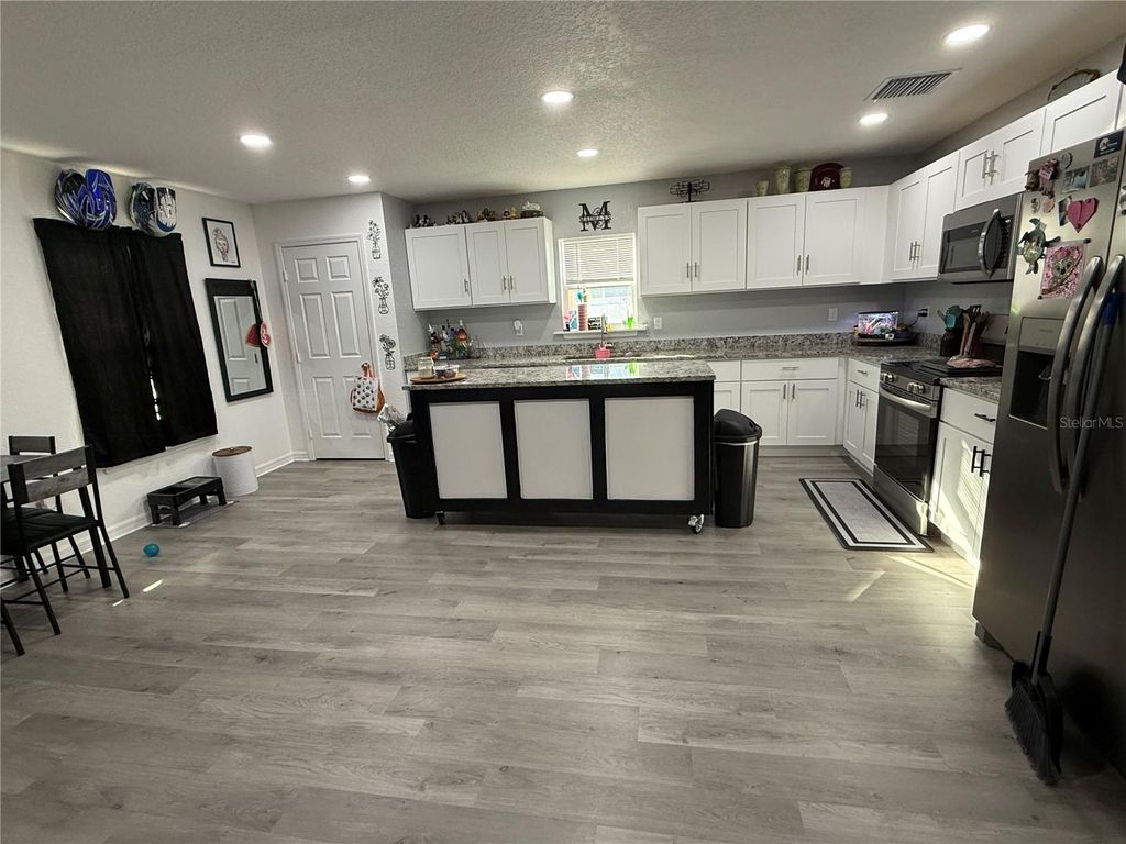 Photo of 428 Four Seasons Avenue, Mascotte, FL 34753 (MLS # G5108071)