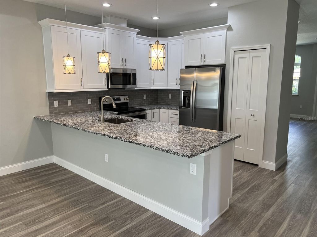 Photo of 45 Wellham Lane, Palm Coast, FL 32164 (MLS # FC318099)