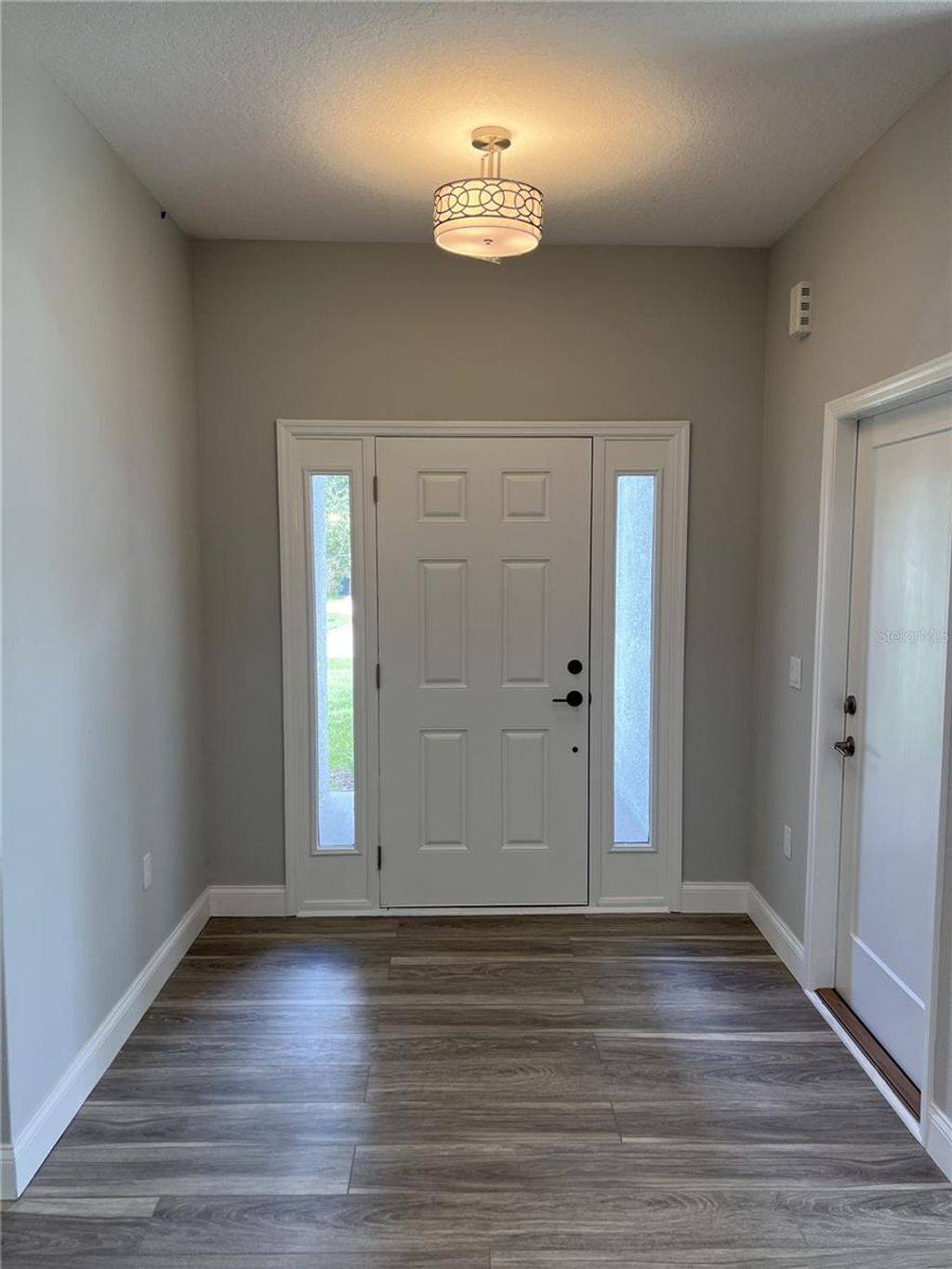 Photo of 45 Wellham Lane, Palm Coast, FL 32164 (MLS # FC318099)