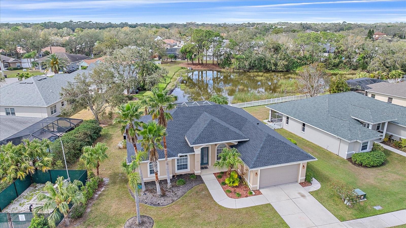 Welcome to 2260 Island Creek Road, a beautifully maintained 4-bedroom, 2.5-bath executive pool home located in the quiet, sought-after community of Shadow Oaks Estates in Sarasota. This spacious residence offers over 2,100 square feet of living space with a split floor plan, high ceilings, and abundant natural light. The open layout includes a versatile fourth bedroom that can easily serve as a home office or den. The modern kitchen features stainless steel appliances and solid wood cabinetry, while the primary suite includes a walk-in closet and a luxurious en-suite bath. Step outside to your private screened-in pool with serene water views—perfect for relaxing or entertaining. Recent updates include a new roof (2023), newer AC (2020), and a water heater (2021), ensuring peace of mind and energy efficiency. Nestled in a community of just 54 homes, this rental offers both privacy and a welcoming neighborhood feel. Located just minutes from I-75, the Celery Fields, shopping, dining, and Sarasota’s world-renowned beaches, this home delivers the ideal blend of comfort and convenience. Lawn and pool maintenance are included, and pets will be considered on a case-by-case basis. This is Florida living at its finest—available now for long-term lease.