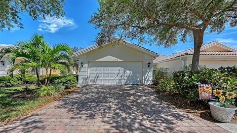 Photo of 5579 Modena Place, Sarasota, FL 34238 (MLS # A4688104)