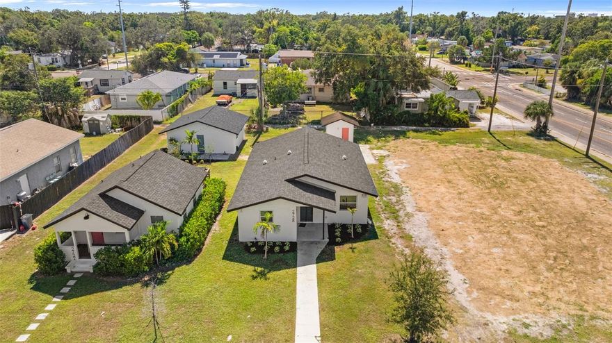 CASH FLOWING AND OCCUPIED**NO FLOOD ZONE**INCREDIBLE INVESTMENT OPPORTUNITY in the heart of ST. PETERSBURG! This CORNER-LOT parcel spans 3.5 LOTS and includes THREE CASH-FLOWING PROPERTIES (4 UNITS TOTAL): a 3-BEDROOM, 2-BATH HOME, a 2-BEDROOM, 2-BATH HOME, and TWO REMODELED STUDIO UNITS. All units were FULLY UPDATED IN 2022 with NEW ROOFS, KITCHENS, FLOORING, DOORS, TRIM, and PAINT, and the property received NEW LANDSCAPING IN 2025. The CURRENT OWNERS HAVE PERMITTED THE TEAR-DOWN of a former 5-unit structure (INCLUDING ASBESTOS REMOVAL) and REZONED THE PROPERTY to allow for UP TO 13 UNITS—giving the next investor the ability to COLLECT RENT WHILE YOU BUILD. PRIME LOCATION just MINUTES TO CENTRAL AVENUE, DOWNTOWN ST. PETE, and the WAREHOUSE ARTS DISTRICT, with easy access to the TROPICANA FIELD REDEVELOPMENT AREA, the BEACHES, and I-275. Surrounded by NEW CONSTRUCTION and THRIVING LOCAL BUSINESSES, this HIGH-DEMAND RENTAL AREA offers STRONG CURRENT INCOME, ENDLESS APPRECIATION POTENTIAL, and an AMAZING OPPORTUNITY to DEVELOP IN ONE OF ST. PETE’S FASTEST-GROWING CORRIDORS. 2722 14TH AVE S 2 BEDROOM HOUSE, 2728 14TH AVE S 3 BEDROOM HOUSE, 2722 14TH AVE UNIT A AND B STUDIO UNITS AND 1416 28TH AVE S (WAS 5 UNIT TEAR DOWN)
