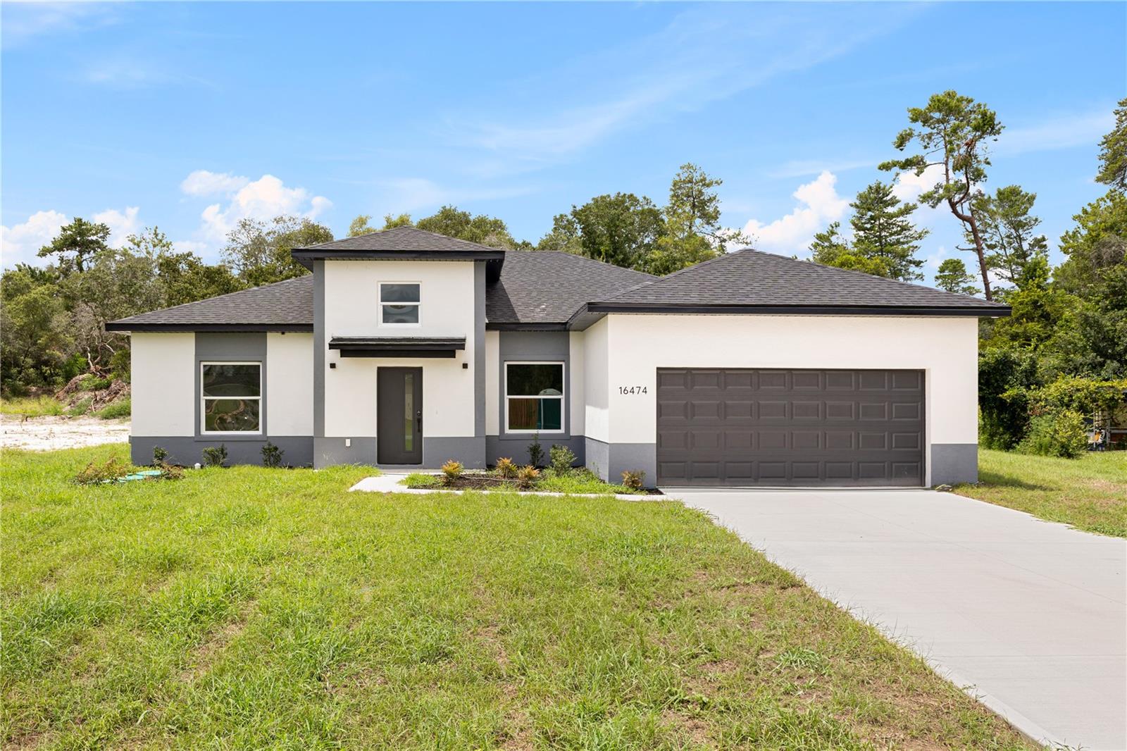 LARGE LOT!!! 0.53 ACRES!!! SUPERIOR QUALITY STANDARD!!!
Discover this stunning new construction home in Ocala, perfectly situated on a spacious 0.53-acre lot—offering ample room for outdoor living, gardening, or even future additions like a pool or RV space.
This modern residence stands out in Marion Oaks with a superior quality standard and differentiated design compared to others in the area. Inside, you’ll find 4 bedrooms, 2 bathrooms, a 2-car garage, and a convenient laundry room. The home boasts an impressive 10-foot ceiling throughout, while most homes in the area have only 8-foot ceilings—giving it a brighter, more open feel.
The L-shaped kitchen is a unique feature, designed for functionality and flow, and comes fully equipped with stainless steel appliances that complement the open-concept layout beautifully.
This home is also equipped with an advanced ATU septic system—an anaerobic treatment unit that separates solids and liquids efficiently, ensuring better environmental performance and lower maintenance.
With over half an acre of land, this property offers space, privacy, and the freedom to create the outdoor lifestyle you’ve always wanted. A rare find in a growing community!