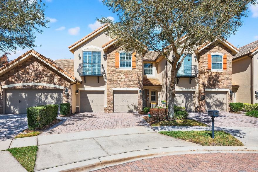 **Seller may consider buyer concessions if made in an offer**Welcome to elevated living in the highly sought-after 24-HOUR GUARD-GATED community of Eagle Creek in the heart of Lake Nona. This IMPECCABLY MAINTAINED 4-bedroom, 3.5-bath townhome offers approximately 2,000 SQUARE FEET of beautifully curated living space, blending eye-catching design with modern comfort. From the moment you arrive, the paver driveway, decorative stone façade, and elegant GLASS-PANEL ENTRY DOOR set a tone of upscale living. Inside, you’re welcomed by a stunning OPEN-CONCEPT DESIGN where the Living, Dining, and Kitchen spaces flow effortlessly together—ideal for both entertaining and everyday comfort. BRAND-NEW LUXURY VINYL PLANK FLOORING (2025) extends throughout the home, while PLANTATION SHUTTERS (2019) add timeless elegance and architectural charm. The Dining area is enhanced by a STYLISH ACCENT WALL and sliding glass doors that open to your private covered and screened lanai, complete with paver flooring and an insulated roof (2022). In the Living Room, a DRAMATIC FEATURE WALL rises gracefully up the staircase, creating a striking focal point that feels both modern and grand. The CHEF-INSPIRED KITCHEN is truly a showpiece, appointed with crisp white cabinetry, gleaming granite countertops, a stylish tile backsplash, stainless steel appliances, and an EXPANSIVE BREAKFAST BAR ideal for entertaining in style. A chic powder bath and a thoughtfully designed laundry room with BUILT-IN CABINETRY complete the first level. Ascend the luxury vinyl plank staircase to your private owner’s sanctuary. The stunning Primary Suite exudes sophistication, showcasing a DESIGNER TRAY CEILING AND ACCENT WALL, and a spacious walk-in closet. The SPA-INSPIRED en suite bath, UPGRADED IN 2025, offers dual vanities, a sumptuous garden tub, and a glass-enclosed rain shower — creating a tranquil retreat reminiscent of a luxury resort. A secondary bedroom enjoys its own PRIVATE EN SUITE BATH, while two additional bedrooms — including one with a CHARMING JULIET BALCONY — share a beautifully appointed third full bathroom. The layout offers exceptional flexibility for guests, family, or a stylish home office. SIGNIFICANT UPGRADES ensure both beauty and peace of mind, including NEW HVAC SYSTEMS (2024), a NEW WATER HEATER (2025), and UPDATED designer lighting and ceiling fans (2025). Living in Eagle Creek, residents enjoy CHAMPIONSHIP GOLF, multiple sparkling pools, relaxing jacuzzi access, a grand clubhouse, state-of-the-art fitness center, tennis courts, playgrounds, scenic walking and biking trails, and a VIBRANT CALENDAR OF COMMUNITY EVENTS — all within a beautifully landscaped, master-planned setting. Ideally located in SOUGHT-AFTER LAKE NONA, you are moments from Medical City, the USTA National Campus, Lake Nona Town Center, Boxi Park, upscale dining, boutique shopping, and TOP-RATED SCHOOLS. With CONVENIENT ACCESS to SR-417, SR-528, and Narcoossee Road, commuting to Orlando International Airport, downtown Orlando, and Florida’s world-renowned beaches is effortless. This is MORE THAN A TOWNHOME — its a statement of lifestyle, elegance, and location.  Schedule your tour today!