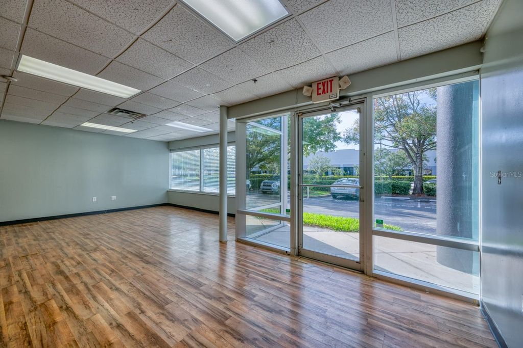 Photo of 7575 Kingspointe Parkway #5, Orlando, FL 32819 (MLS # O6391300)