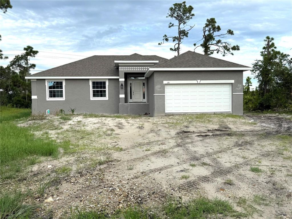 Photo of 135 Hardee Way, Rotonda West, FL 33947 (MLS # C7508823)