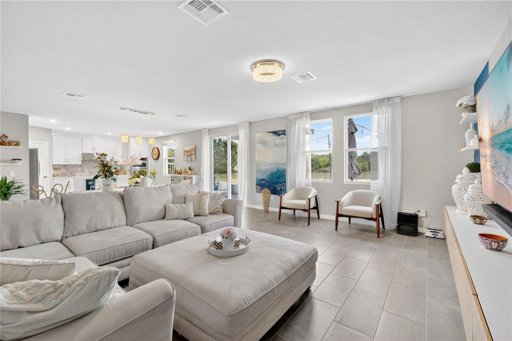 Photo of 441 Whistling Duck Trail, Saint Cloud, FL 34771 (MLS # S5148495)
