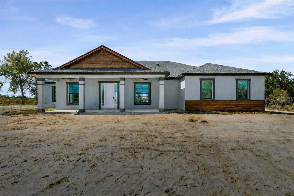 Photo of 6137 Grove Boulevard, Punta Gorda, FL 33982 (MLS # A4679056)