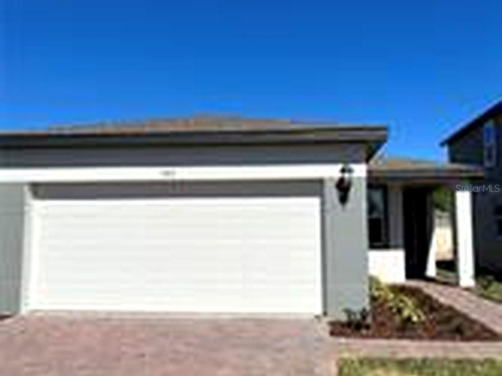 Photo of 953 Rivers Crossing Street, Clermont, FL 34714 (MLS # TB8504361)