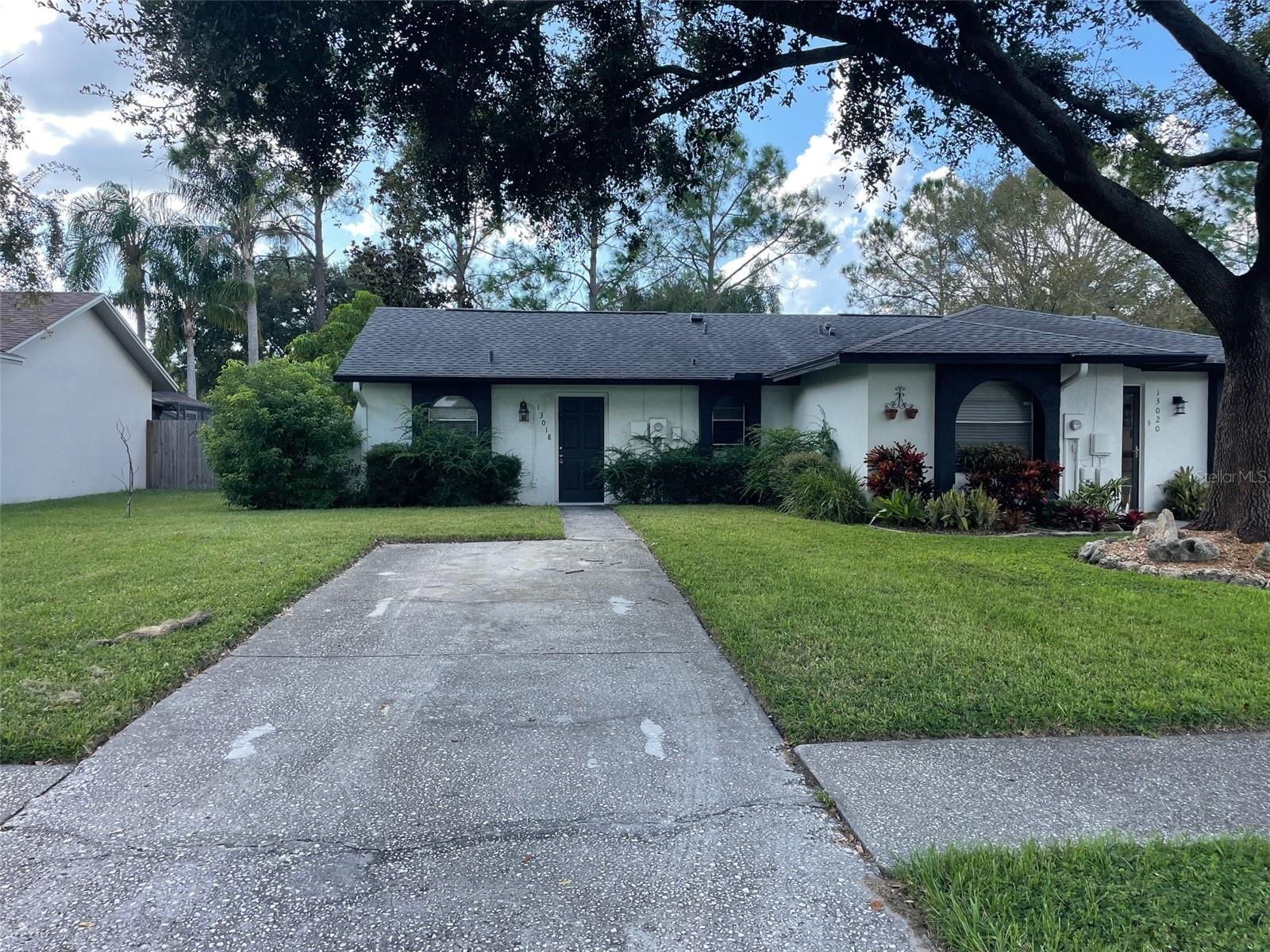 Charming Attached Villa with Community Perks! Welcome to your cozy new haven! This delightful one-bedroom, one-bathroom villa in Huntington by the Village in Carrollwood offers the perfect blend of low-maintenance living and fantastic community amenities. With 624 sqft of heated living space, this home is efficiently designed and ready for you to move in. You'll love the convenience of the interior laundry hookup, making chores a breeze. Step outside and relax on your spacious 240 sqft porch, the ideal spot for your morning coffee or evening unwind. The backyard features a wood privacy fence, creating a secluded and peaceful area for gardening, pets, or just enjoying the outdoors. The $95/month HOA fee is a small price to pay for big benefits: front lawn maintenance, scheduled exterior painting, beautiful community pool and racquetball court. This is a fantastic opportunity for a first-time homebuyer, someone looking to downsize, or an investor seeking a great rental property. Don't miss out on this charming home where convenience meets community!