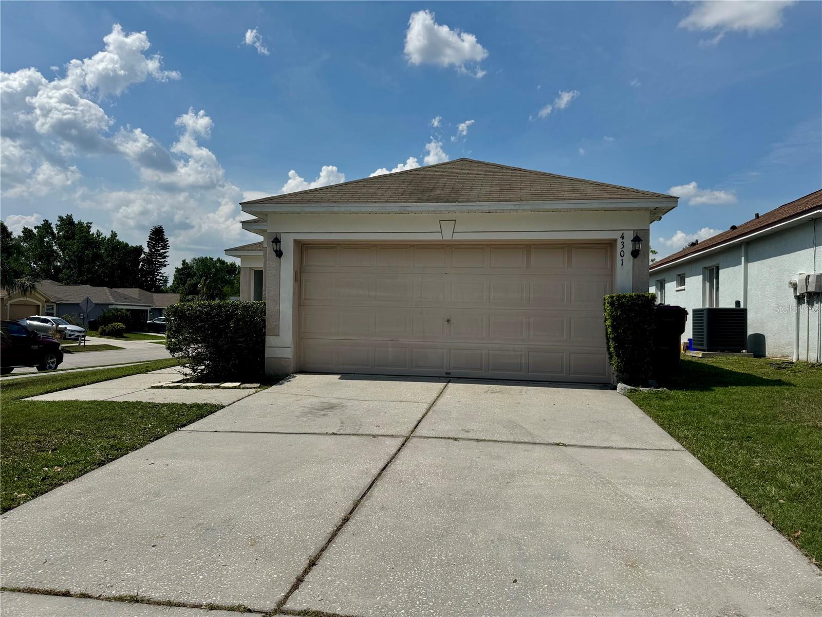 Spacious 3-bedroom, 2-bathroom block home with a 2-car garage situated on a corner lot. This home features an open floor plan with split bedrooms, vaulted ceilings, and stylish waterproof laminate and tile flooring throughout. Enjoy added comfort with ceiling fans and walk-in closets. The property includes washer and dryer hookups, a fully fenced backyard with a gated entry, and a metal storage shed for extra space. At time of move in, a $75 tenant processing fee will be due along with any rent and deposit(s). Tenants must make three times the rental amount monthly, credit score of 600 or higher, no evictions, credit and background checks are required. No Pets!