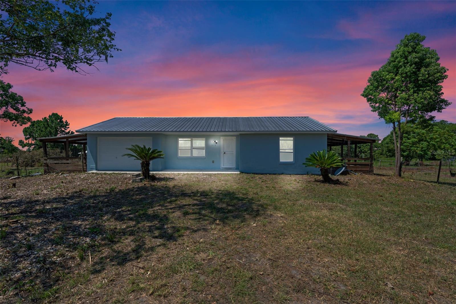 Nestled on over 9 acres of serene countryside, this concrete block home offers endless possibilities. The residence features a brand-new metal roof and provides a solid foundation for customization with just a little TLC. The expansive property is bordered by large pastures, creating a peaceful and private setting. A 40' x 60' pole barn offers abundant space for storage, equipment, or future projects. With its ideal combination of land, location, and potential, this property is perfect for those seeking a rural lifestyle or an investment opportunity.