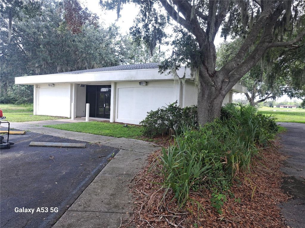 Photo of 6481 Deland Avenue, Indian Lake Estates, FL 33855 (MLS # O6342690)