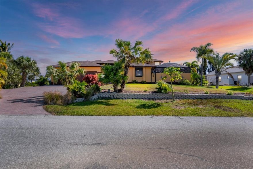 This Spanish and Italian inspired grand courtyard villa offers a blend of classic architecture, magnificent indoor and outdoor living space, and modern coastal construction quality. Priced to sell, the property is a tremendous value with 25,000 sq.ft. of land, nearly 2,800 sq.ft. of air conditioned space, nearly 2,000 sq.ft. of pool and lanai area, a 3 car garage, and room for a large outbuilding shed or additional garage. Gorgeous mahogany front doors open into the grand courtyard living area and pool lanai. Entertain, dine, or casually lounge in this stunning space with a large Spanish styled fountain offering serene water trickling sounds. The separate guest cabana suite offers unique privacy and opens directly onto the courtyard, and has its own full bath . The cabana is a favorite for guests and their hosts. The main home has another guest bedroom, den/office two full baths and the master suite upstairs has a charming balcony overlooking the courtyard pool area, and offers tremendous sunset views and partial views of the Intracoastal Waterway. The open layout combines the spacious kitchen, large great room and dining room creates into one sensational space with tall vaulted ceilings. The over half acre of land is beautifully landscaped with large mature tropical foliage, towering palm trees, and an enormous paver driveway that accommodates parking for multiple large vehicles. Engineered plans for a 22x24 outbuilding garage and much of the concrete block necessary to construct the garage are included in the purchase. The Association allows fencing, outbuildings, and room for vehicles. The Association has a private beach on Don Pedro Island, kayak launch and clubhouse. The picturesque Vanderbilt developed waterfront neighborhood brilliantly designed with over half acre lots winding around canals and the Intracoastal Waterway, and has grand banyan tree lined streets. The home is walking or golf cart distance to essential shopping, restaurants, and is close to historic Boca Grande, miles of tranquil beaches, three full service marinas, numerous golf courses, and world-class backwater and tarpon fishing.