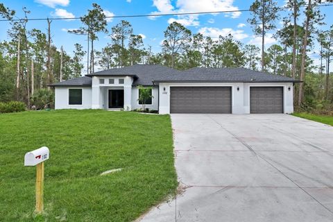 Photo of 1102 Edison Avenue, Lehigh Acres, FL 33972 (MLS # TB8456454)