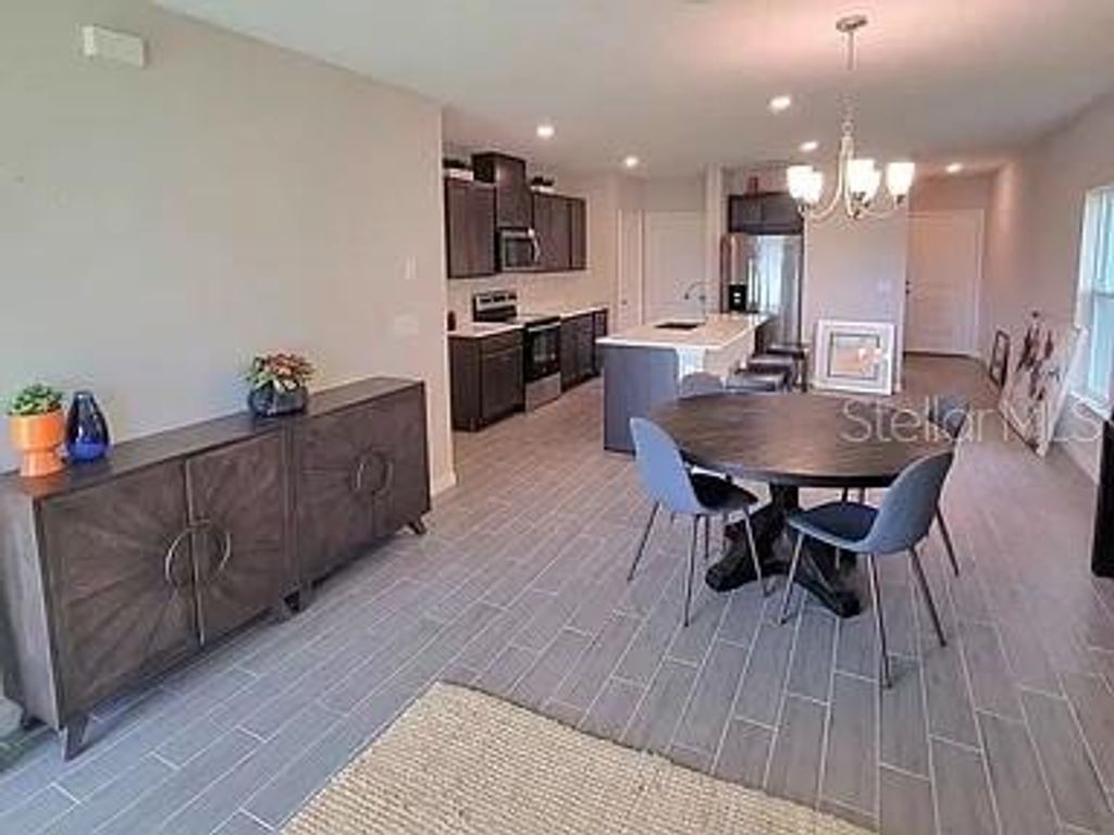Photo of 1316 Mirabella Circle, Davenport, FL 33897 (MLS # O6400683)