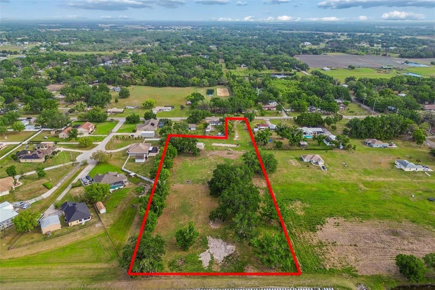 Build your dream home on this beautiful, high-and-dry parcel ideally located near Sam Allen Oaks and surrounded by several high-end homes in the desirable Cork, Tomlin and Strawberry Crest areas.  Offering both privacy and convenience, the property is bordered by mature trees along the perimeter, creating a peaceful, secluded setting. Currently zoned for one home per acre, this versatile property allows for a custom estate, farm animals, or even a mobile or modular home...giving you flexibility to create exactly what you envision. Two existing wells are already in place, adding additional value and convenience. Enjoy the charm of country-style living while being just minutes from I-4, shopping and everyday essentials. The property backs up to a strawberry farm and a former plant nursery, enhancing the natural surroundings and open feel.  A survey is available, and with approximately 90-95% of the land in X flood zone, no flood insurance is required for the majority of the property (only a small southeast corner fall within AE).  Opportunities like this are becoming increasingly rare, now is the time to secure your piece of land in a sought after location and start building your future today!
