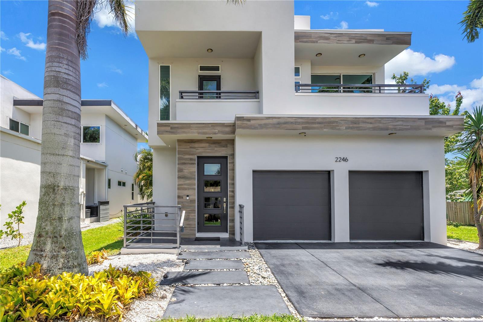 One or more photo(s) has been virtually staged. Your Sarasota Dream Home Awaits: PRIME LOCATION Modern Elegance Near Siesta Key & Downtown! Welcome to your beautiful move-in ready home in a highly sought-after Sarasota neighborhood! Built in 2017, this stunning 4-bedroom, 3.5-bath residence offers the perfect blend of modern living and everyday comfort for those seeking sophisticated design, stylish interiors, and a prime location within Sarasota, Florida. Imagine a lifestyle where you're just minutes from the world-famous Siesta Key Beach (ranked #1 in 2025!), top-rated schools, and the vibrant Downtown Sarasota scene. Step inside and be greeted by soaring 20-foot ceilings and an abundance of natural light in the expansive great room – an ideal space for entertaining friends or enjoying quality family time. The heart of this home is the gourmet kitchen fit for a chef, featuring high-end KitchenAid stainless steel appliances, including a sleek induction cooktop, soft-close drawers, and a generous pantry. Seamlessly transition to your custom-covered patio, perfect for al fresco dining and enjoying the Florida sunshine. The private, tropical lush backyard, pampered by pros, is your personal oasis, complete with a sparkling pool surrounded by mango and lemon trees – imagine weekend barbecues and refreshing swims! Retreat to the serene main-level primary suite, your private sanctuary. The spa-inspired en suite bathroom boasts dual vanities, a walk-in shower, and an oversized closet that feels like a dressing room. Convenience is key with the laundry room conveniently located off the kitchen and a stylish powder room for guests. Upstairs, a cozy loft area provides flexible space for a home office, playroom, or media center. Three additional bedrooms offer plenty of room for family or guests. The first upstairs bedroom features its own en suite bathroom and private balcony – a perfect spot to enjoy the gentle Sarasota breezes. Two more well-sized bedrooms share a beautifully appointed bathroom. Beyond the exquisite interiors, this home offers an unbeatable lifestyle. Enjoy quick trips to the soft quartz sands of Siesta Key Beach, explore the boutiques and restaurants of St. Armands Circle, or easily grab groceries at the nearby new Publix at The Landings. Families will appreciate the proximity to top-rated Sarasota schools. This meticulously maintained home boasts 2,471 square feet of thoughtfully designed living space and a spacious 2-car garage, large enough for all your toys. It’s more than just a house; it’s your gateway to the coveted Sarasota lifestyle. This home is perfect as a primary residence, vacation home or an investment! Located in a high and dry neighborhood in Flood Zone X, therefore Flood Insurance is NOT required, plus there is NO HOA or CDD Fees. Enjoy peace of mind knowing this home is solidly constructed, withstood hurricane-force winds and has not experienced any flooding. Schedule your showing today and imagine your life thriving here.