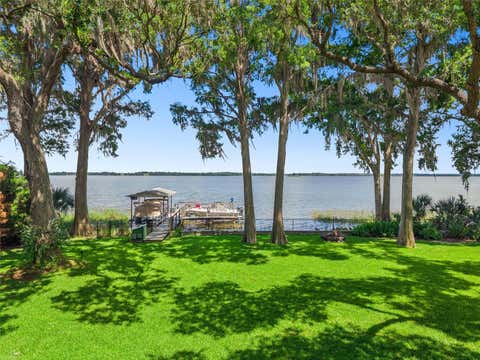 Photo of 1000 N Lakeshore Boulevard, Howey In The Hills, FL 34737 (MLS # O6428479)