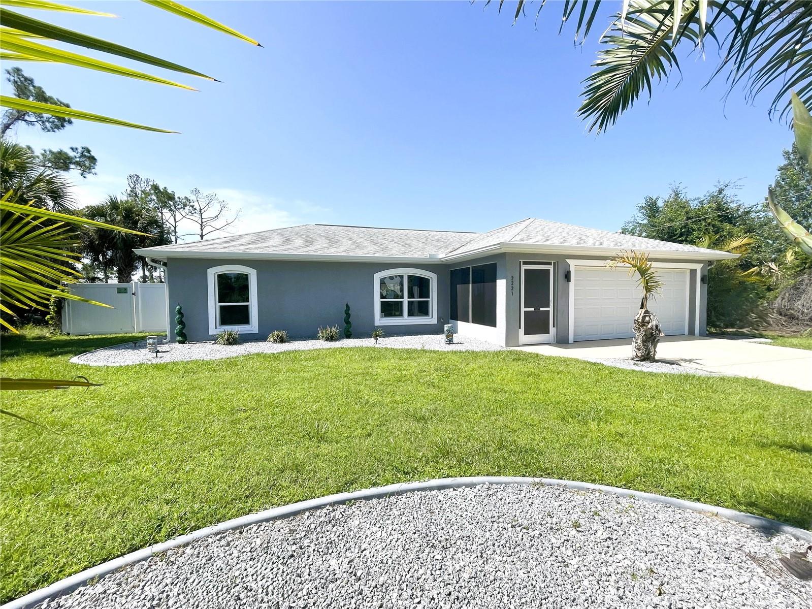 Impressive POOL HOME charmer loaded with updates! Situated in one of North Port’s most sought-after areas, offering convenient access to I-75, shopping, parks, water sports, restaurants, and more. This updated and well-maintained residence boasts numerous features including cathedral ceilings, an open floor plan with a split bedroom design, brand new Samsung appliances, a Whole-House Reverse Osmosis System, Granite Countertops, freshly painted interior, new ceiling fans and lighting, and brand-new vinyl plank flooring throughout! The exterior showcases custom landscape curbing and stonework, downspouts and gutters, hurricane shutters for all windows, fencing, and an irrigation system to keep your lawn nice and green! A brand new hurricane-rated garage door was installed this year along with a premium belt-drive opener and new side garage door replacement. All windows and slider were updated in 2015. Enjoy your heated, private backyard pool, also new in 2015, complete with a freshly painted deck, screened enclosure (2015)(with pet door), solar heating (2017), and a brand new pool pump installed in 2024. This property is equipped with whole house surge protection and a 50 AMP transfer switch for generator hookup. The fully serviced central air conditioning system with heat pump has been upgraded for optimal performance. Additional updates include a new water heater (2021) and a well pump (2022). This property exemplifies quality and convenience. The perfect home for your Florida lifestyle!