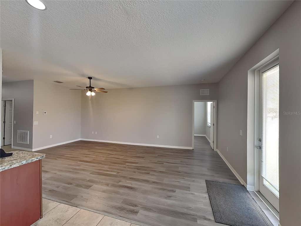 Photo of 231 Blackstone Creek Road, Groveland, FL 34736 (MLS # TB8518053)