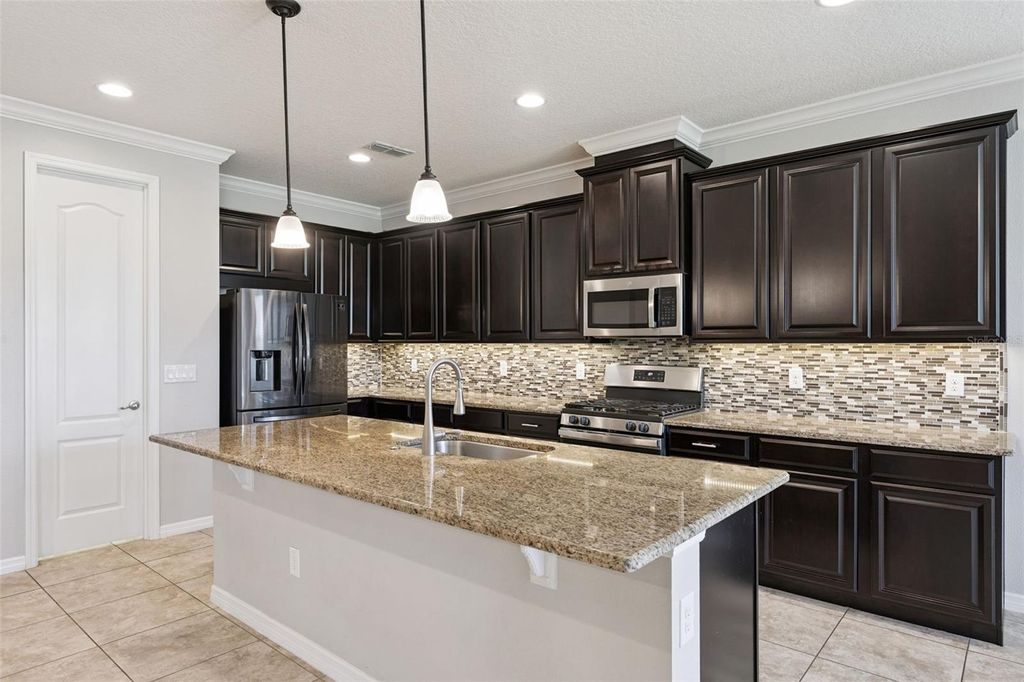 Photo of 553 Autumn Ash Drive, Clermont, FL 34715 (MLS # G5108640)