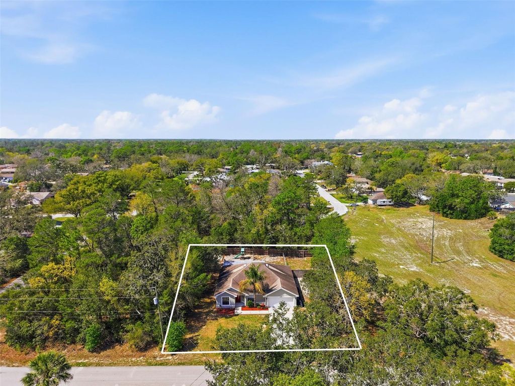 Photo of 3395 Hartley Road, Spring Hill, FL 34606 (MLS # W7883761)