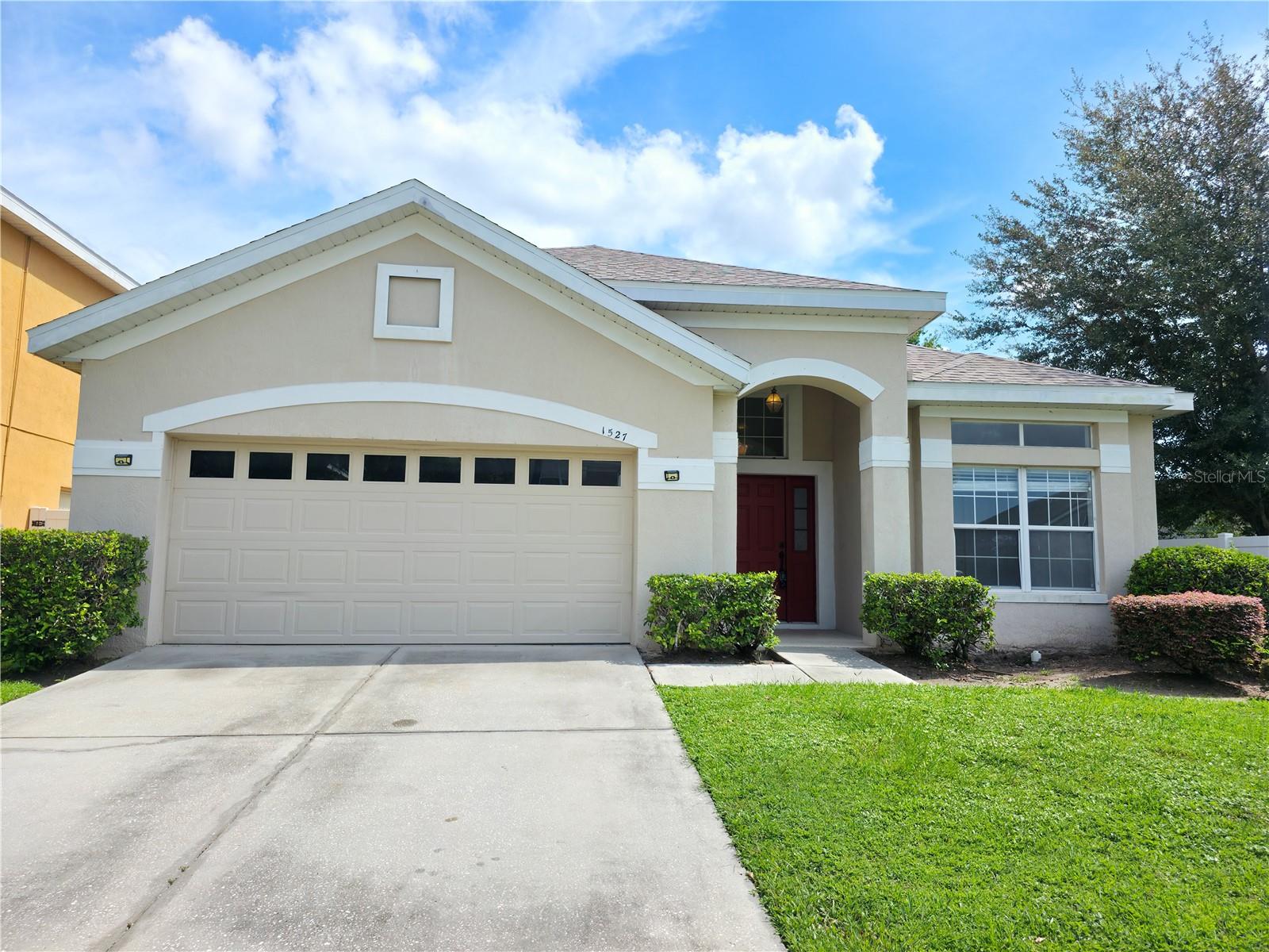 Nestled within the desirable Falcon Trace is this spacious one-story four-bedroom pool home, designed with both comfort and style in mind. The shingles were replaced three years ago and the A/C system was replaced less than three years ago. As you enter the home, you’ll find a versatile bedroom or home office, framed with elegant glass French doors. Just beyond, the open living and dining room awaits, featuring a beautiful tray ceiling and abundant natural light an ideal setting for gatherings and entertaining. The private owner’s suite offers a true retreat with a generous walk-in closet and a luxurious five-piece bath, complete with a dual vanity, relaxing Jacuzzi tub, separate shower, and private water closet. At the heart of the home, the eat-in kitchen boasts 42 inch upper cabinets with crown molding, a closet pantry, breakfast bar, and a dinette area. The kitchen flows seamlessly into the family room, where large windows showcase views of the sparkling screened pool. This backyard oasis is perfect for entertaining—with a PVC privacy fence, oversized pool deck, and plenty of space for lounging under the cover lanai perfect for dining, and enjoying Florida living at its best. This home truly has it all: space, functionality, and a fantastic outdoor retreat. And if you want your children to meet other neighborhood families you also have the outstanding community amenties, which including a resort-style swimming pool complete with a water slide, tennis and basketball courts, a playground, and a peaceful lakefront deck perfect for relaxing, tennis courtes, and a large lake, a relaxing setting for reading to simply unwinding. The property’s location is hard to beat, providing quick access to major routes such as the 417 Central Florida Greenway, Florida Turnpike, Osceola Parkway, and John Young Parkway. Residents are only a short drive from world-famous destinations like Disney, Universal Studios, SeaWorld, and Lake Nona’s Medical City which includes the VA hosptial. For everyday convenience, Endeavor Elementary is within walking distance, while shopping, dining, and entertainment can be found nearby at Hunter’s Creek, The Loop, and stores like Publix, Super Target, CVS, and more.