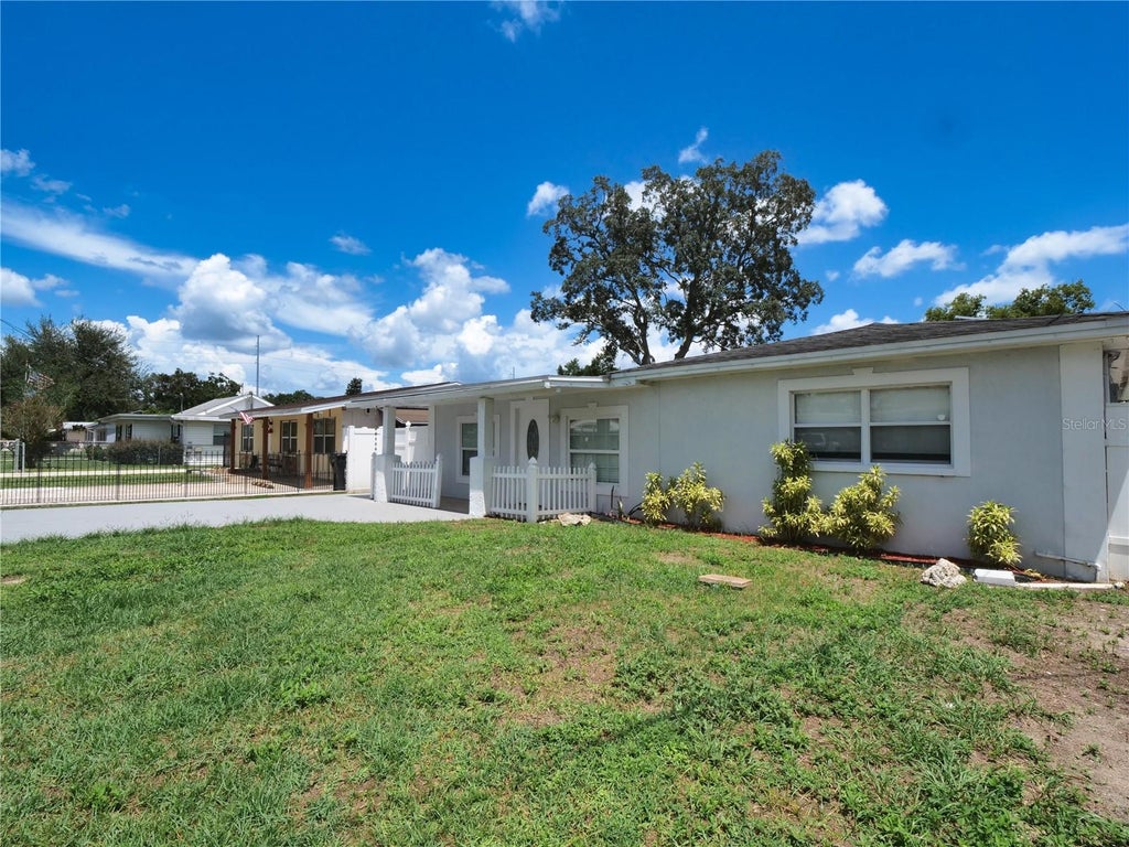 Photo of 7413 N Arrawana Avenue, Tampa, FL 33614 (MLS # O6432553)