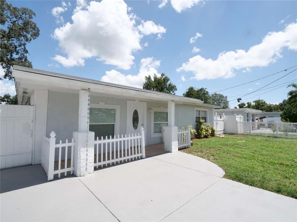 Photo of 7413 N Arrawana Avenue, Tampa, FL 33614 (MLS # O6432553)