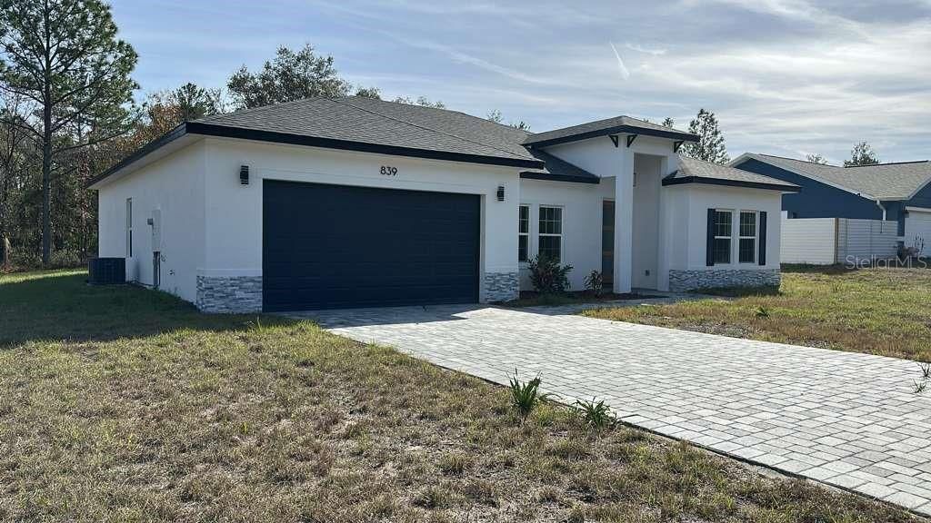 Photo of 839 Marion Oaks Manor, Ocala, FL 34473 (MLS # O6373138)