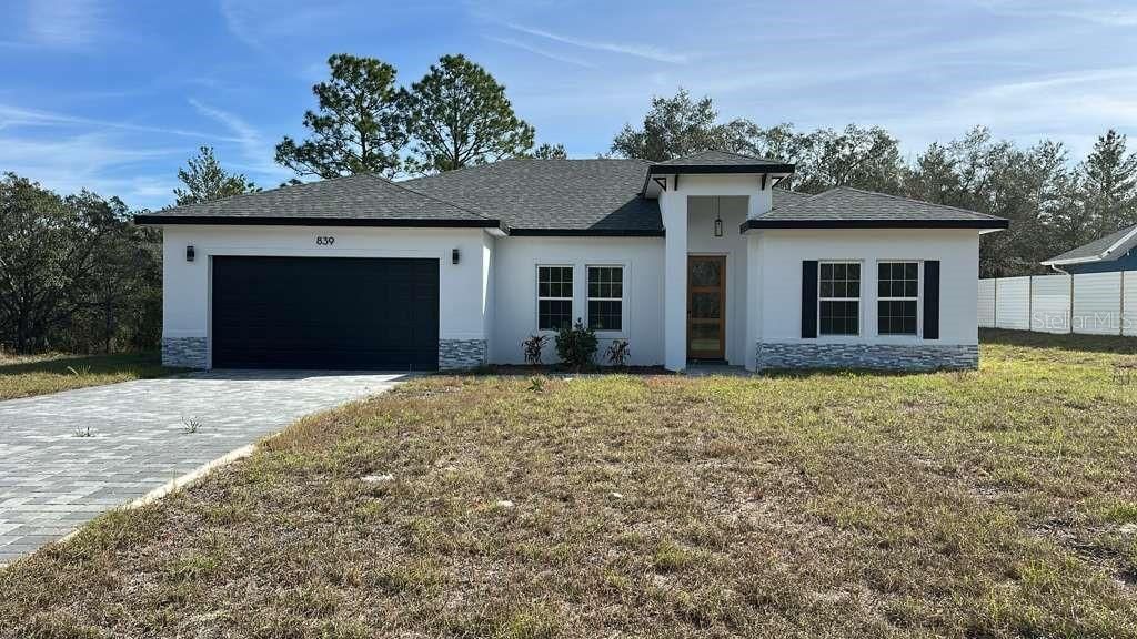 Photo of 839 Marion Oaks Manor, Ocala, FL 34473 (MLS # O6373138)